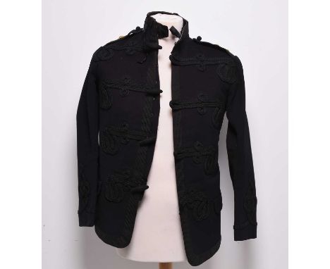 A late Victorian British Army officer's patrol jacket, circa 1890s, constructed of dark blue melton cloth with black frogging