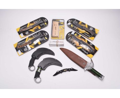 A large collection of boxed hunting and survival knives, including two Special Force Knives with accessories; hunting knife w