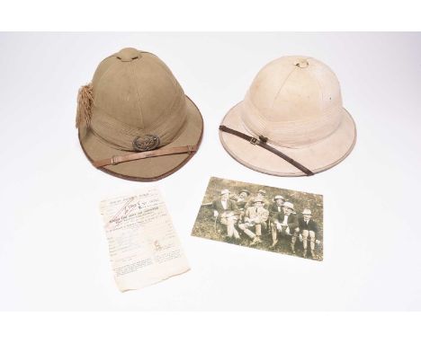 A British Colonial Sudan Defence Force pith or sun helmet, circa 1925-32, manufactured by Lawn & Alder, London, the olive gre
