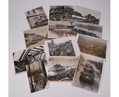 PRESS PHOTOGRAPHY. Campaign in Germany after the crossing of the Rhine, 1945. Eighteen black and white photographs, 19.5cm x 