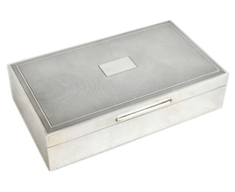 STEPHEN J ROSE &amp; SON; an Elizabeth II hallmarked silver rectangular cigarette box with engine turned cover featuring a va