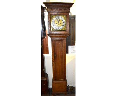 An oak eight day longcase clock with associated movement, the silvered dial set with Arabic and Roman numerals and signed Haz