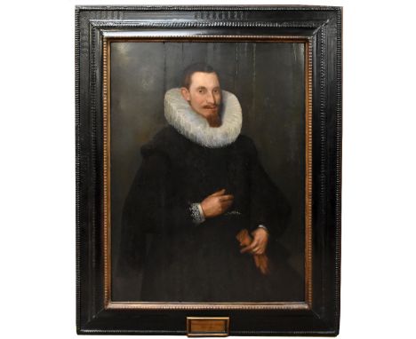 ATTRIBUTED TO CORNELIUS VAN DER VOORT; oil on panel, portrait of a gentleman wearing white lace ruff and holding gloves in le