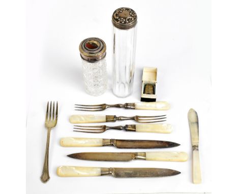 A group of variously hallmarked silver including butter knife with mother of pearl handle, thimble, silver topped dressing ta