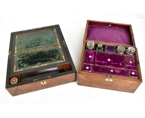 A Victorian burr walnut veneered writing slope with central mother of pearl panel and inlaid decoration, the hinged cover enc