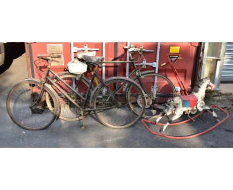 Two vintage bicycles including a Marlboro example, a vintage metal rocking horse and a metal scooter (4).Additional Informati