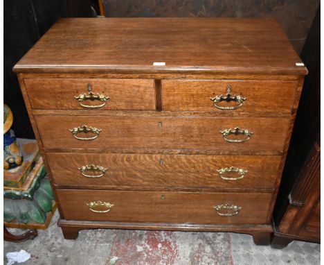 An 18th century oak straight front chest of two short over three long drawers, raised on bracket feet, height 91cm, length 96