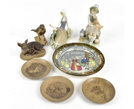 BARBARA LINLEY ADAMS FOR POOLE POTTERY; five pieces of stoneware to include a robin, a model of a fawn, three circular pin di