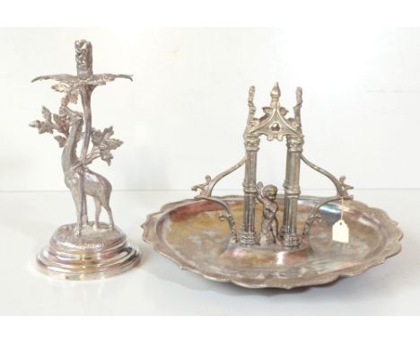 A Victorian silver plated table centrepiece with central cherub beneath arch, 22 x 29 x 33cm (af), and a silver plated epergn