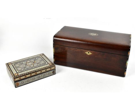 A Victorian inlaid mahogany jewellery box with inlaid mother of pearl and pewter decoration, the hinged cover enclosing four 