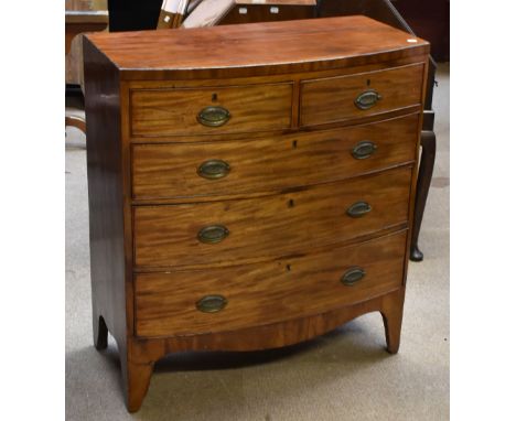 An early 19th century mahogany bowfront chest of two short over three long drawers, raised on bracket feet, height 101cm, len
