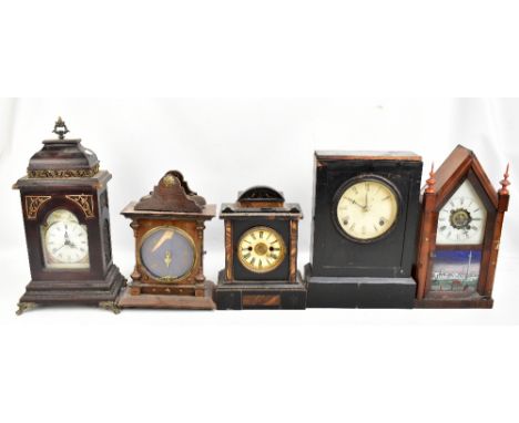 Five Victorian and later mantel clocks to include an American example, a lacquered cased example by C Jerome, height 36cm, et