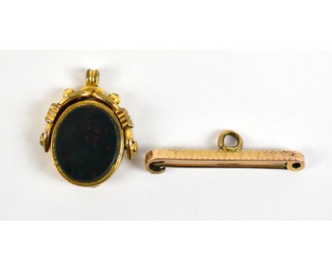 A 9ct yellow gold bar brooch/pin with engine turned detail, stamped 9ct to reverse, length 3.8cm, approx 2.5g, and a gold pla