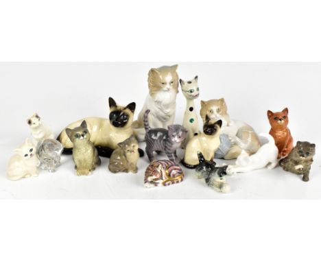 Sixteen ceramic and glass cat figures from various factories to include Beswick, Royal Crown Derby, Nao, Royal Copenhagen, Vi