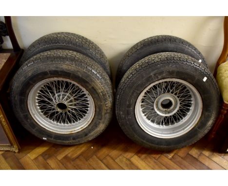 A set of four Pirelli P5205/70 VR15 car wheels with wirework spokes, previously on an Aston Martin DB6.