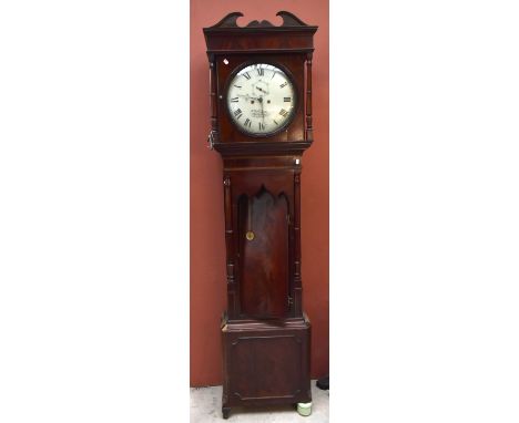 An early 19th century inlaid mahogany longcase clock, the circular dial set with Roman numerals and featuring subsidiary dial