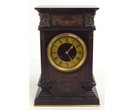 S MARTI &amp; CIE; a Victorian slate mantel clock with bronzed metal applied mask heads and floral detail, the dial marked 'T
