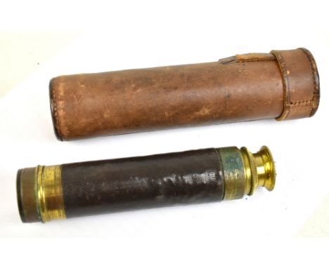 A small three drawer early 20th century brass telescope with stitched leather body and leather outer case, length when closed