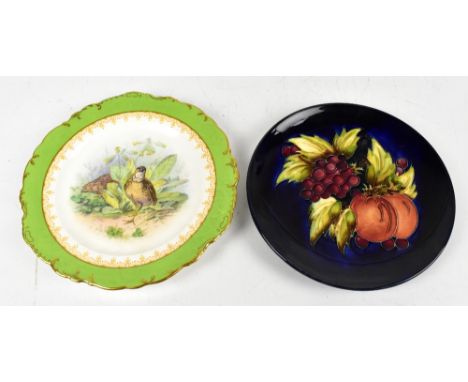 MOORCROFT; a tubeline decorated plate featuring fruit, impressed marks and W M monogram to reverse, diameter 21.7cm (second q