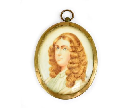 An early 20th century oval portrait miniature depicting Moliere and bearing the initials 'H.T.', inscribed 'Moliere' to the b