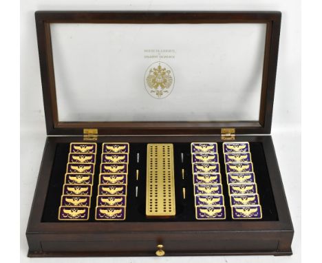HOUSE OF FABERGÉ; a set of 'Fabergé Imperial Dominoes' in mahogany cabinet, with booklet and board.Additional InformationGene