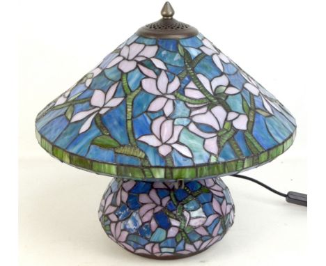 A modern Tiffany style table lamp decorated with floral sprays, height 40cm.Additional InformationGeneral wear, the shade is 