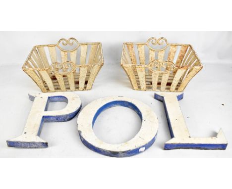 Three vintage painted metal letters 'POL', heights approx 30cm, and two pierced metal baskets.Additional InformationSlightly 