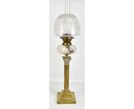 A Victorian brass Corinthian column oil lamp with cut glass reservoir and frosted glass shade, height 76cm.Additional Informa