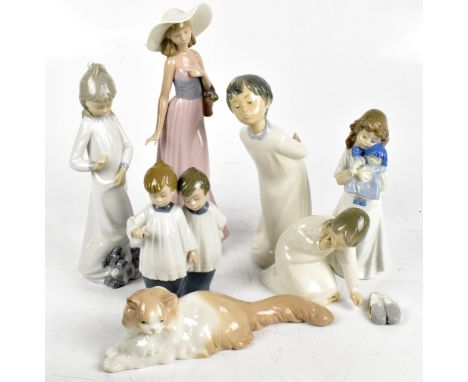 NAO; six figures comprising a lady with flower basket, children and a cat (one af), and a further Lladro example (af) (7).Add