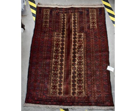 An Afghanistan prayer rug with camel hair ground, Jan Bhegi Belouch Tribes, 141 x 109cm.Additional InformationLight general w