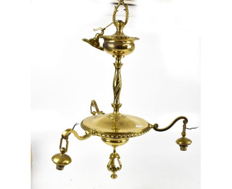A late 19th/early 20th century brass ceiling light raised on single cylindrical twisted stem with three swinging branches, he