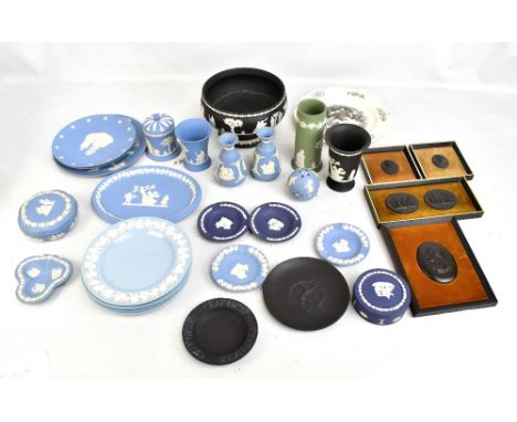 WEDGWOOD; a group of jasper ware including four pre-production/trial black basalt cameos, two featuring classical friezes, ea