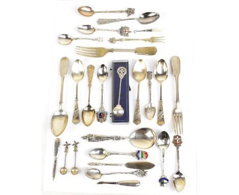 A group of hallmarked silver souvenir spoons with enamelled examples including Chester, London and Cambridge University, a Ru