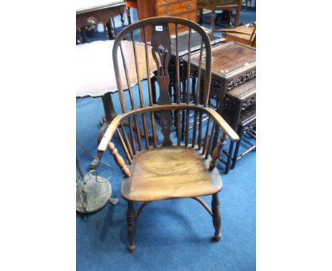 A stick back Windsor chair