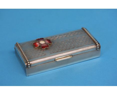 A Continental 'Silver' snuff box, the top with red enamelled flower, stamped Silver, weight, 120.3 grams / 3.8oz