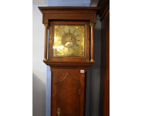 An oak cased long case clock, brass dial signed Ralph Weston