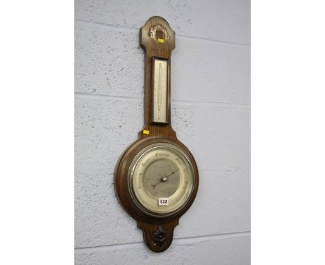 An oak wheel barometer