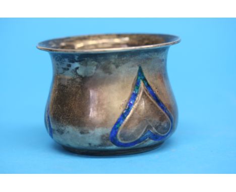 A small silver Art and Crafts design bowl, by William Hair Haseler for Liberty's, decorated with 3 stylised hearts enamelled 