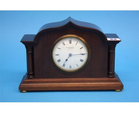 An Edwardian mantel clock with circular white dial, R. Stewart Glasgow, 26cm wide