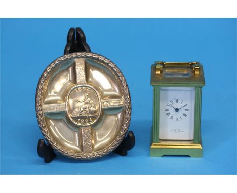 A modern silver Bank of England 1694 - 1994 dish and a small J.W.Benson of London miniature carriage clock, 8.5cm height
