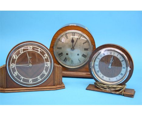 An Art Déco 1930's walnut mantel clock, an Oak clock and Mahogany mantel clock (3)