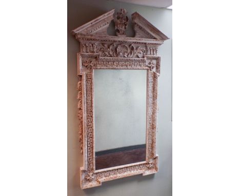 A pair of large wall mirrors after William Kent, in cream distressed well carved frames in a classical antique style with age
