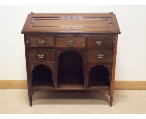 An Edwardian mahogany bureau with fitted interior with five drawers and open shelf under, the top with pierced brass gallery,