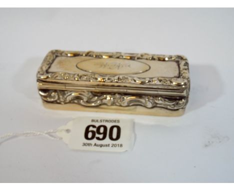 A silver stamp or patch box marked Sterling with applied floral decoration, overall length 3" weight approx 21/2 ozs 