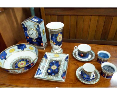 A few pieces of Royal Worcester Millennium china to include mantle clock, fruit bowl, vase etc  