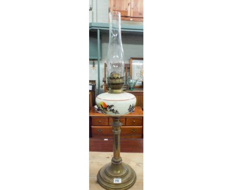 A Victorian brass column oil lamp with coloured glass bowl 