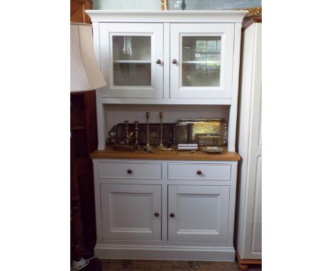 A good quality light oak and cream painted glazed kitchen dresser with drawers and cupboards under, 45" wide 