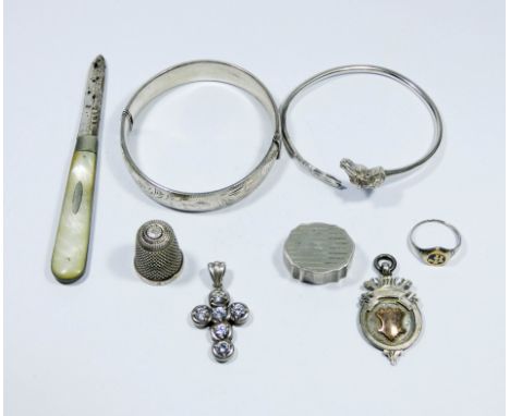 Silver horse head motif bangle, silver thimble, hinged bangle, medallion and other items of silver