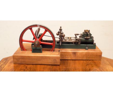A live steam stationary engine on oak base approx 16" x 5", 7 1/2" tall 