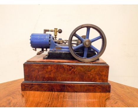 A live steam stationary steam engine on wooden base approx 11" x 6", 9" high 